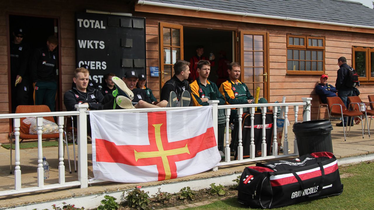Guernsey's squad watches from the pavilion, Jersey v Guernsey, ICC World Cricket League Division Five, St Martin, May 25, 2016