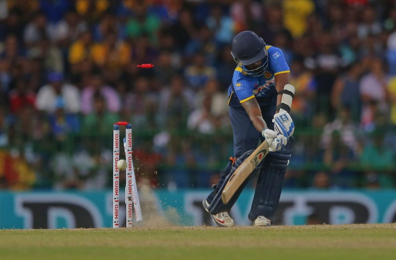 Amila Aponso is bowled by Mitchell Starc, Sri Lanka v Australia, 2nd ODI, R Premadasa Stadium, August 24, 2016