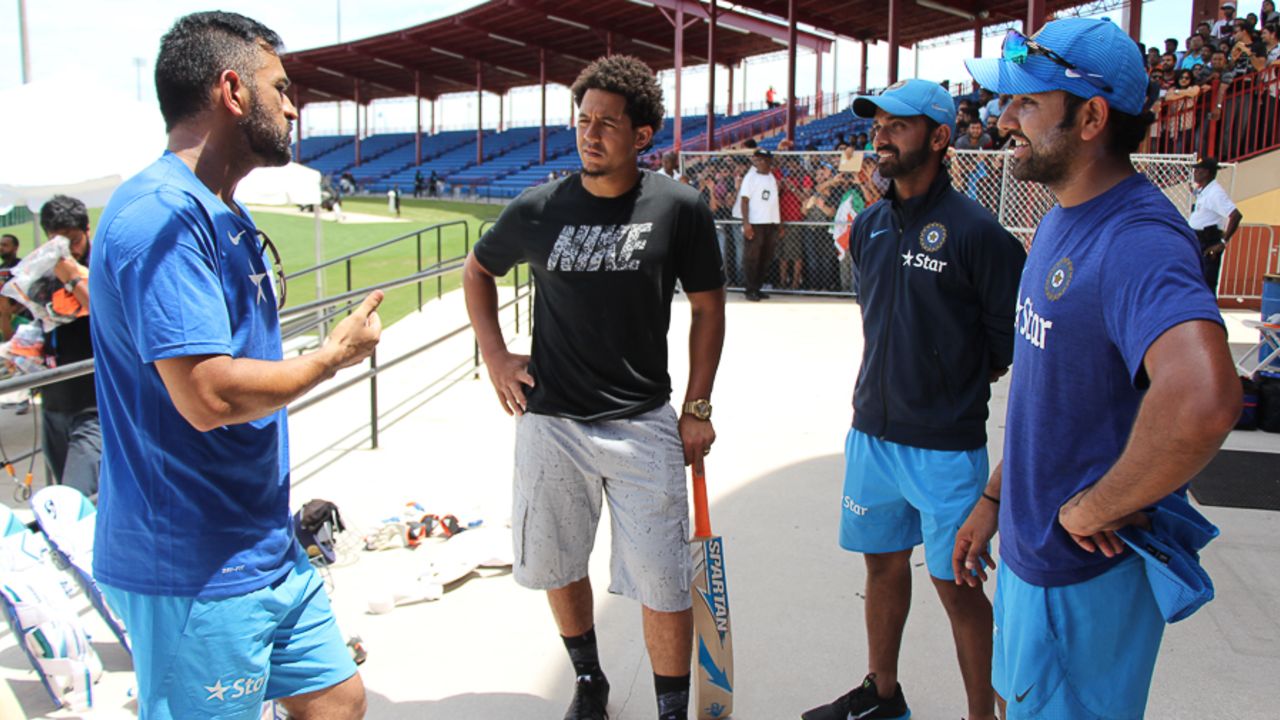 MS Dhoni talks with San Diego Padres outfielder and Miami native Jon Jay about cricket, Lauderhill, August 26, 2016