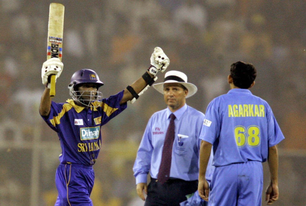 Tillakaratne Dilshan acknowledges the applause from the dressing room, India v Sri Lanka, fifth ODI, Rajkot, November 6, 2005