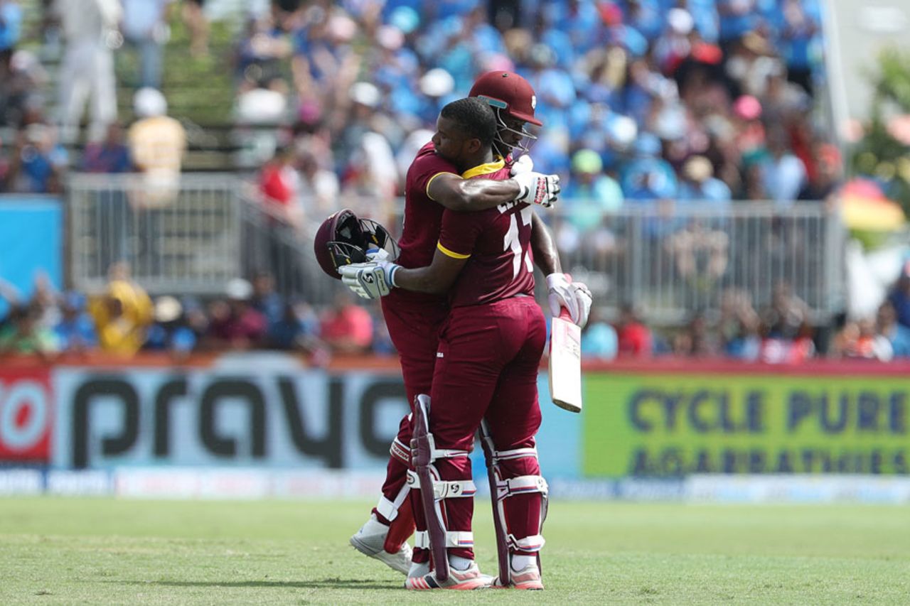 Evin Lewis is congratulated after reaching his maiden T20I ton, India v West Indies, 1st T20I, Florida, August 27, 2016