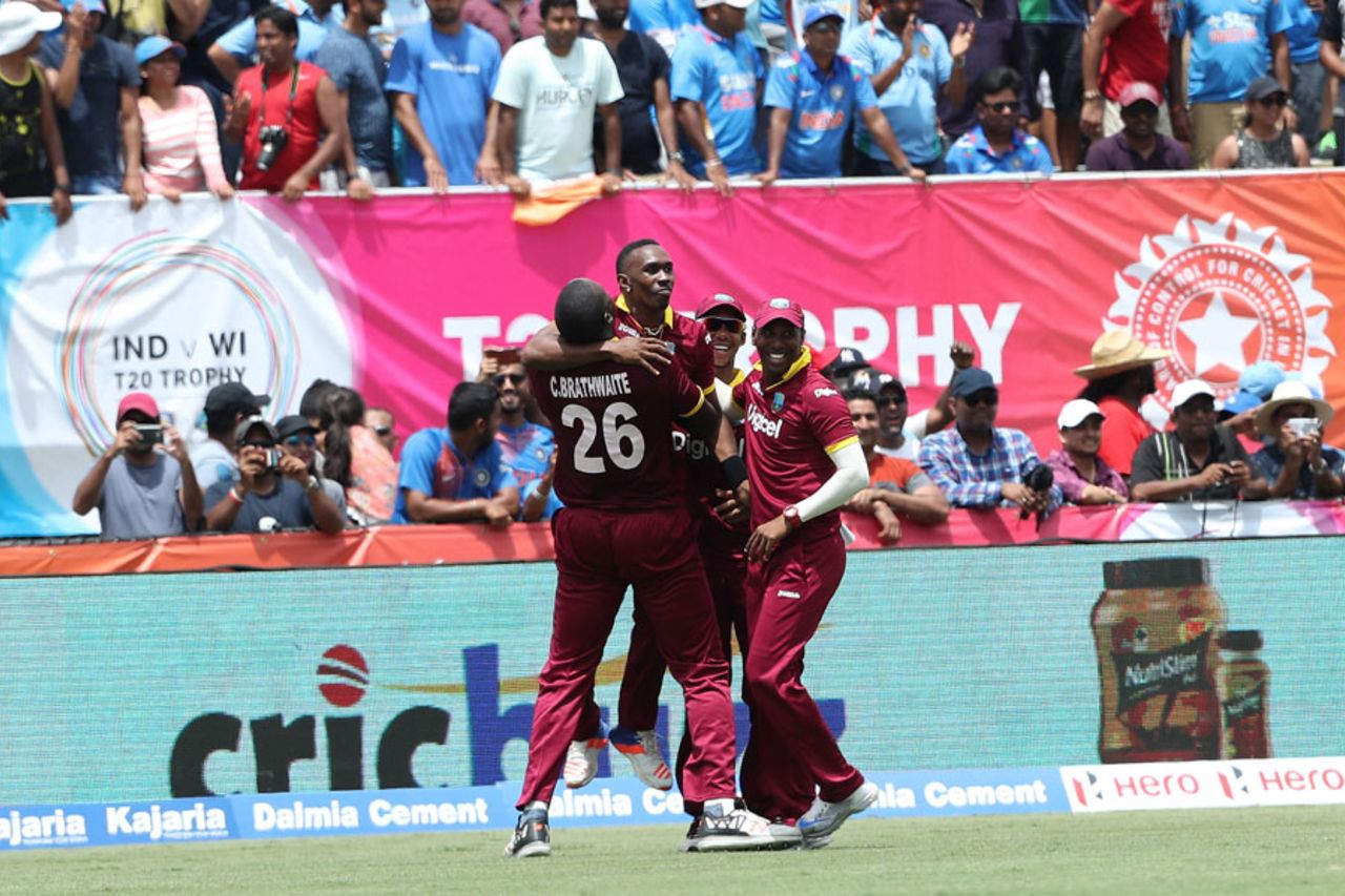 Dwayne Bravo exults with his team-mates after West Indies' one-run win, India v West Indies, 1st T20I, Florida, August 27, 2016