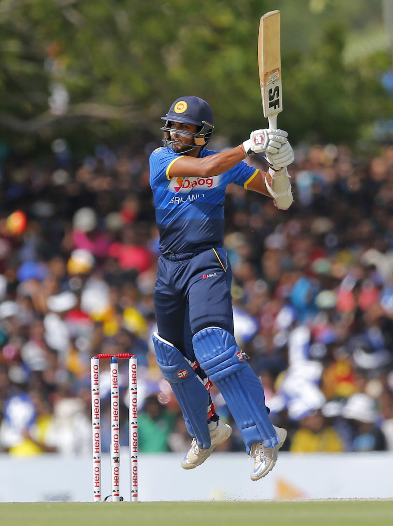 Dinesh Chandimal goes air borne to smash the ball, Sri Lanka v Australia, 3rd ODI, Dambulla, August 28, 2016
