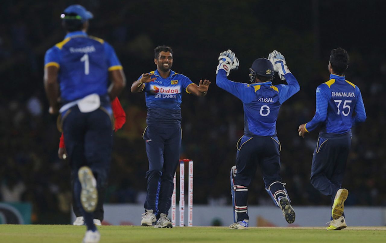 Dilruwan Perera is all smiles after removing Travis Head, Sri Lanka v Australia, 3rd ODI, Dambulla, August 28, 2016