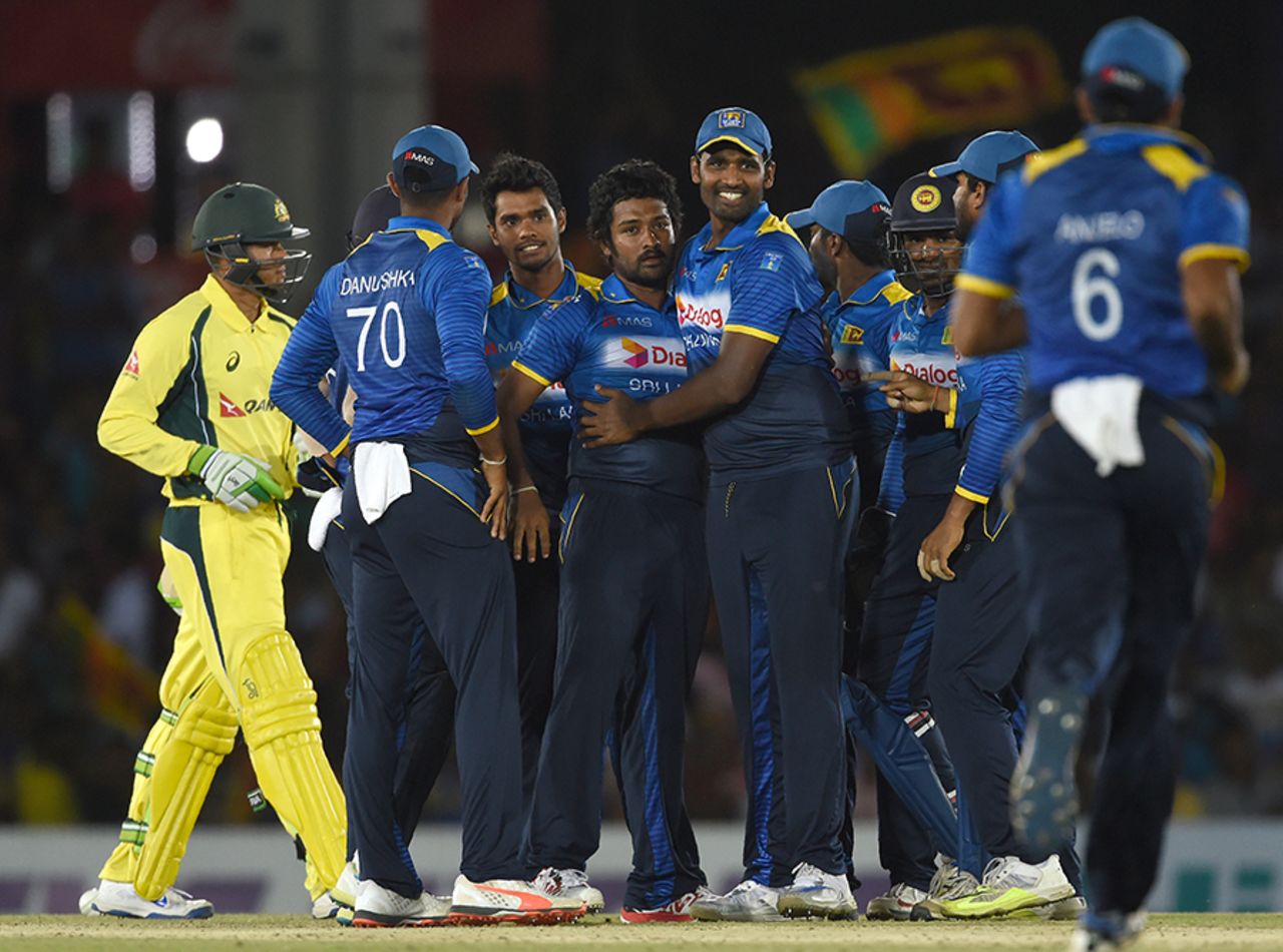 Team-mates gather around Sachith Pathirana after he took the wicket of Usman Khawaja, Sri Lanka v Australia, 4th ODI, Dambulla, August 31, 2016