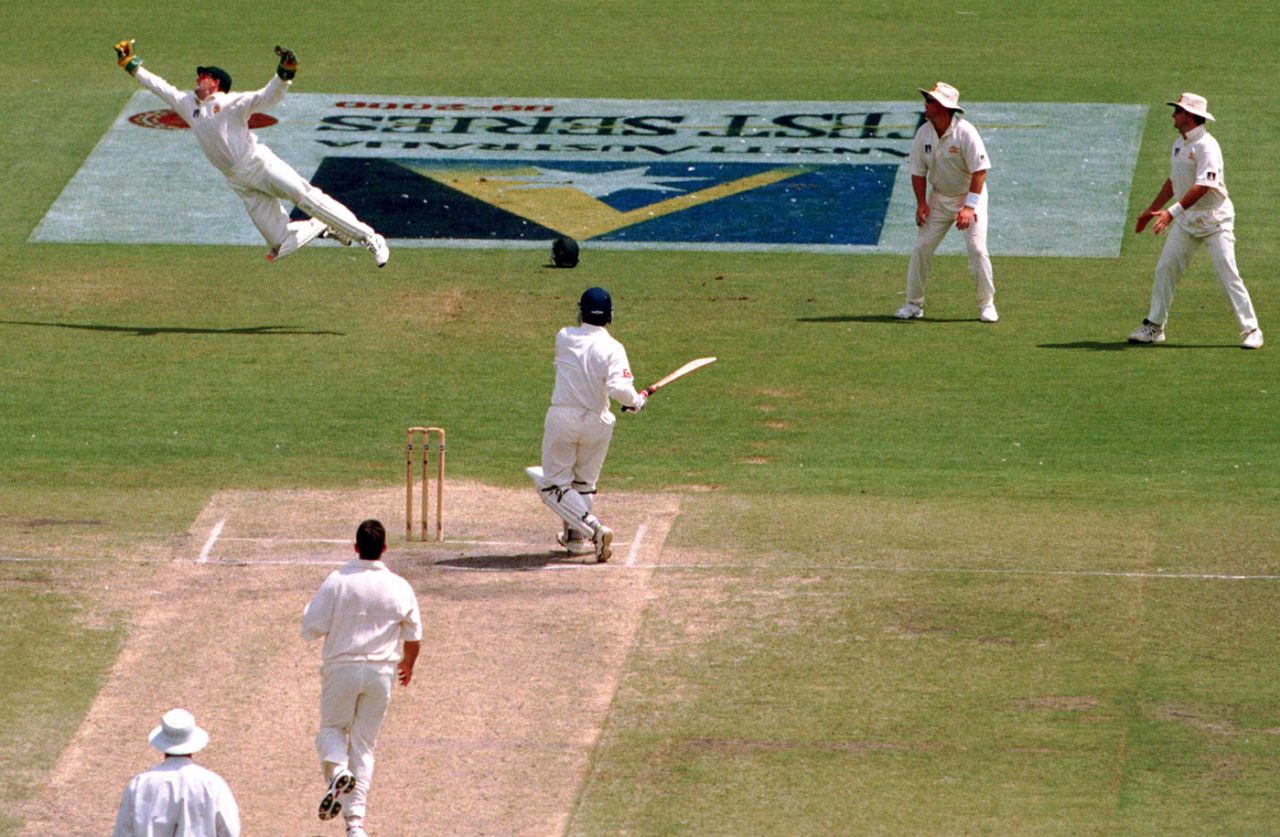 Adam Gilchrist dives to take a catch to dismiss Sourav Ganguly for 43, Australia v India, 1st Test, Adelaide, 5th day, December 14, 1999