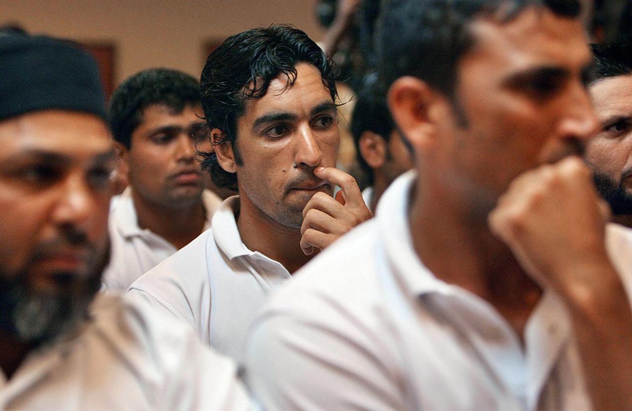 Members of the Pakistan team look on as captain Inzamam-ul-Haq announces his retirement from ODIs the day after Pakistan's loss to Ireland, Kingston, March 18, 2007