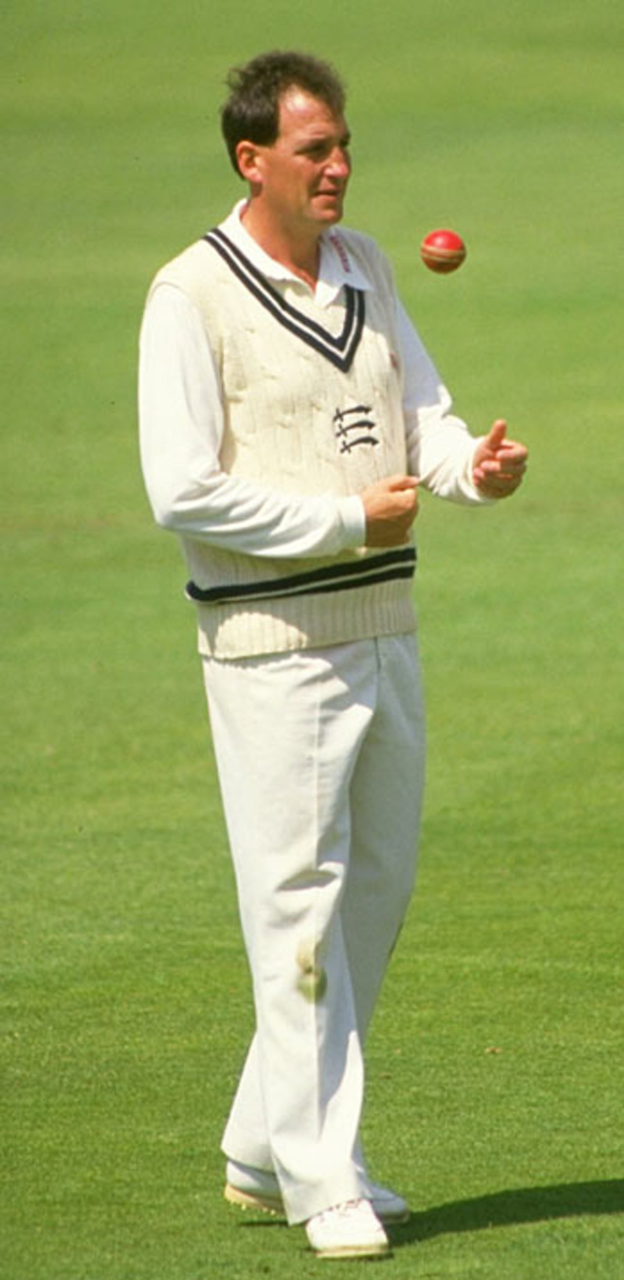 John Emburey prepares to bowl during a Nat West match against Kent at Lord's, 1990
