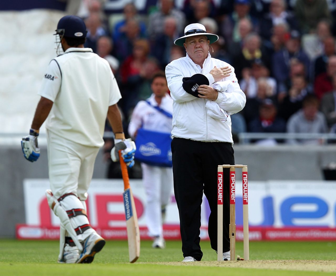 Umpire Steve Davis reverses a decision, England v India, third Test, day one, Edgbaston, August 10, 2011