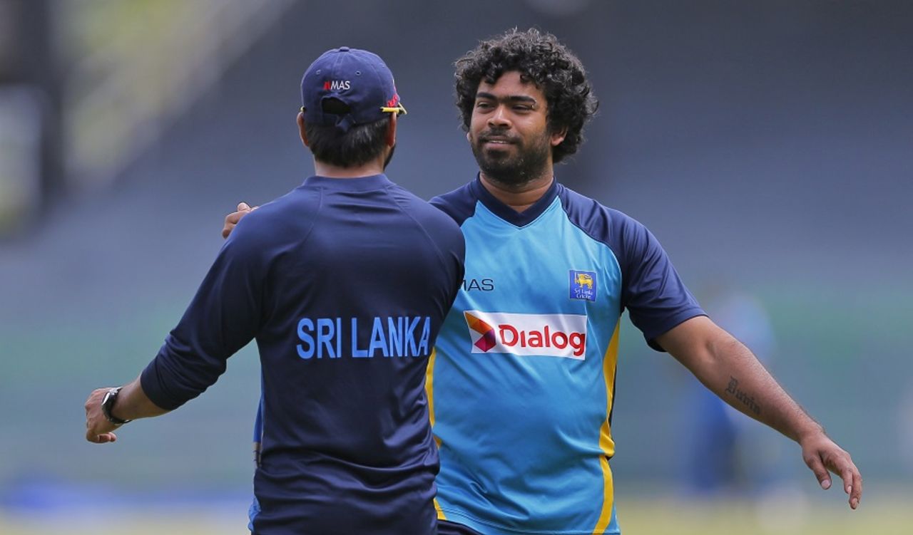 Lasith Malinga is greeted by trainer Dilshan Fonseka, Colombo, September 8, 2016