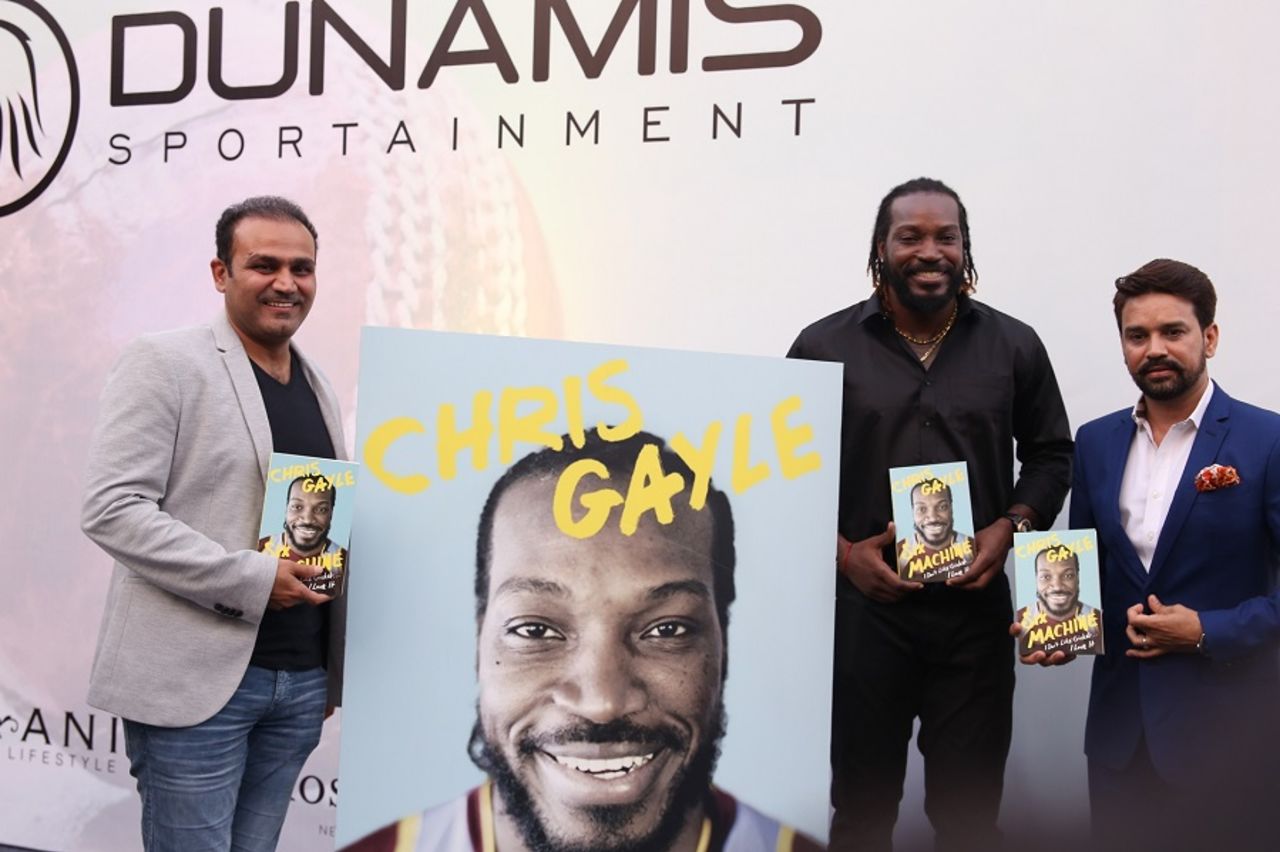 Virender Sehwag, Chris Gayle and Anurag Thakur at the launch of Gayle's autobiography <i>Six Machine</i>, New Delhi, September 9, 2016