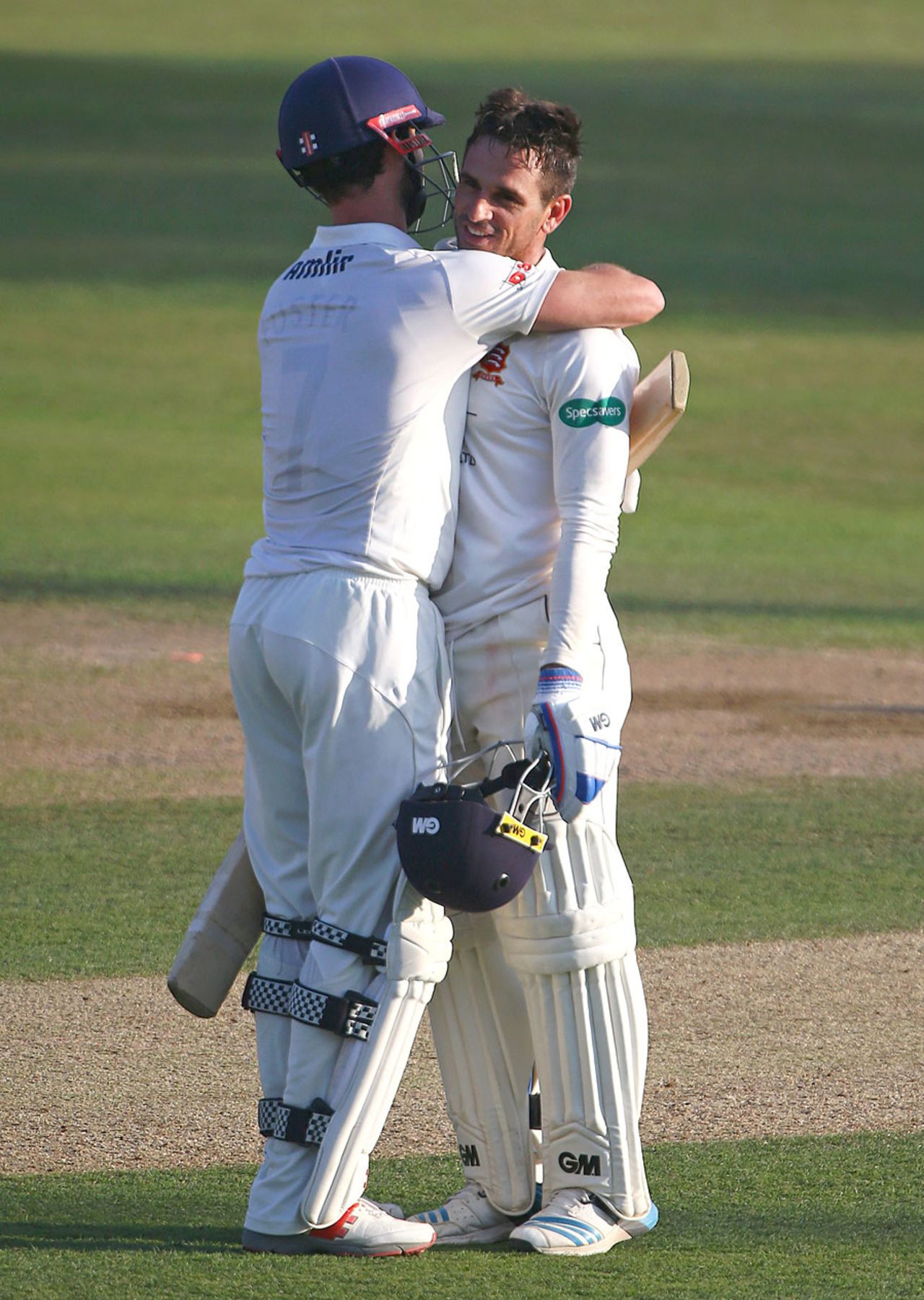 James Foster embraces Ryan ten Doeschate as the Division Two title is clinched, Essex v Glamorgan, County Championship, Division Two, Chelmsford, 2nd day, September 13, 2016