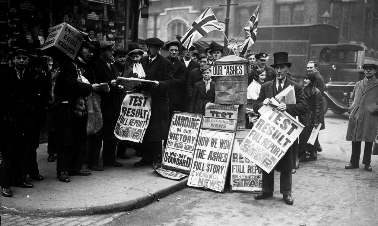 The newspaper salesmen sell newspapers reporting England's victory in the Bodyline Ashes, February 16, 1933