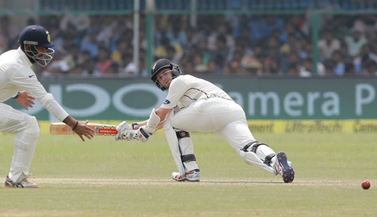 Kane Williamson executes the paddle sweep, India v New Zealand, 1st Test, Kanpur, 2nd day, September 23, 2016