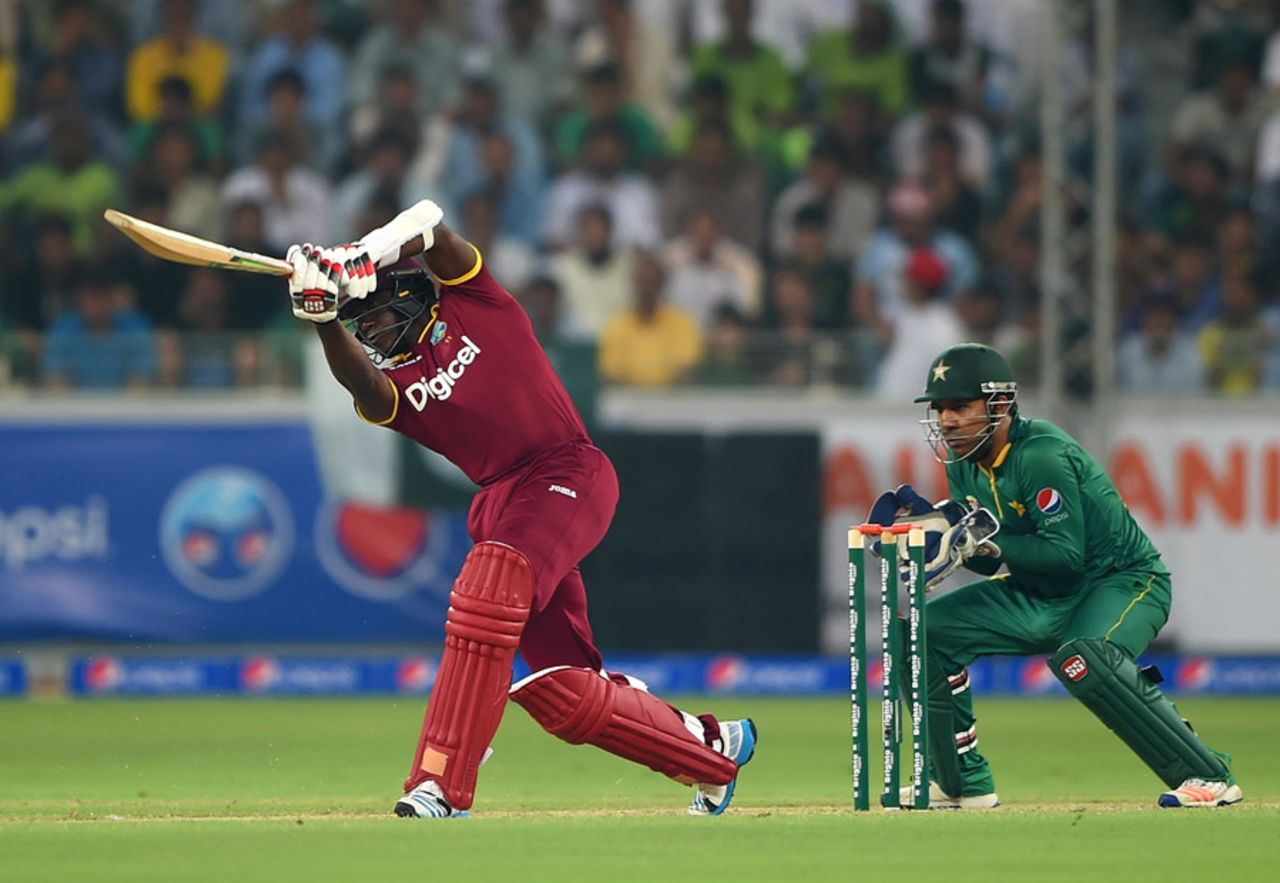 Jerome Taylor drives down the ground, Pakistan v West Indies, 1st T20I, Dubai, September 23, 2016