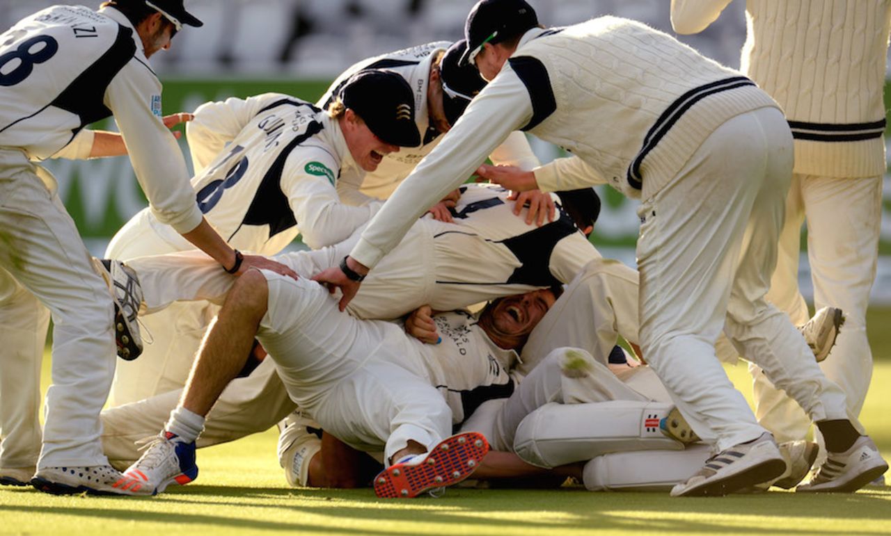 The Middlesex players engulf Toby Roland-Jones, Middlesex v Yorkshire, County Championship, Division One, Lord's, September 23, 2016