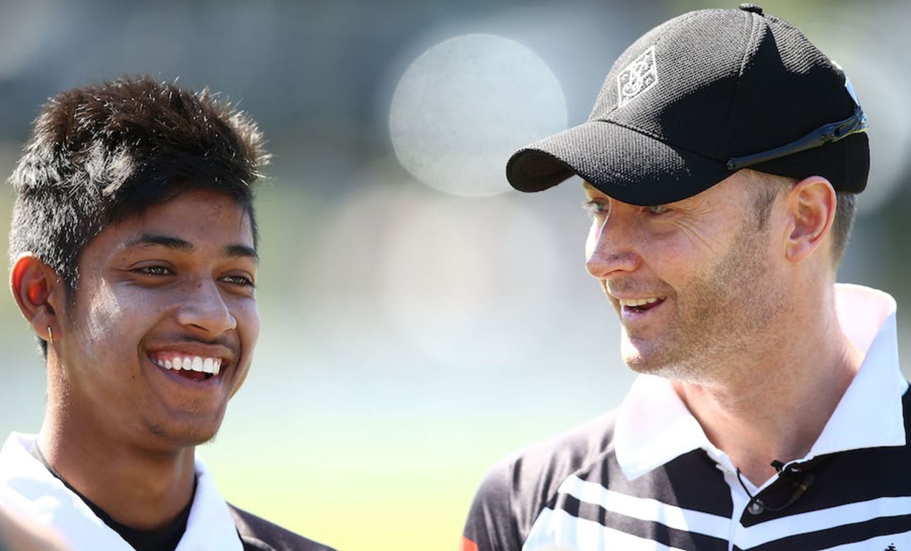 Michael Clarke and Nepal cricketer Sandeep Lamichhane share a reason to smile, Sydney, September 24, 2016