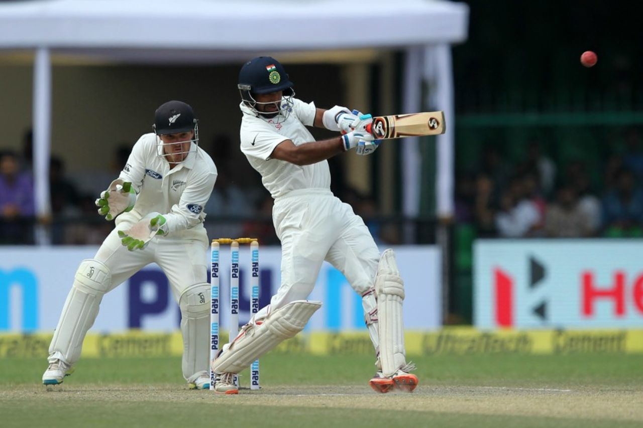 Cheteshwar Pujara lays into a short ball, India v New Zealand, 1st Test, Kanpur, 3rd day, September 24, 2016