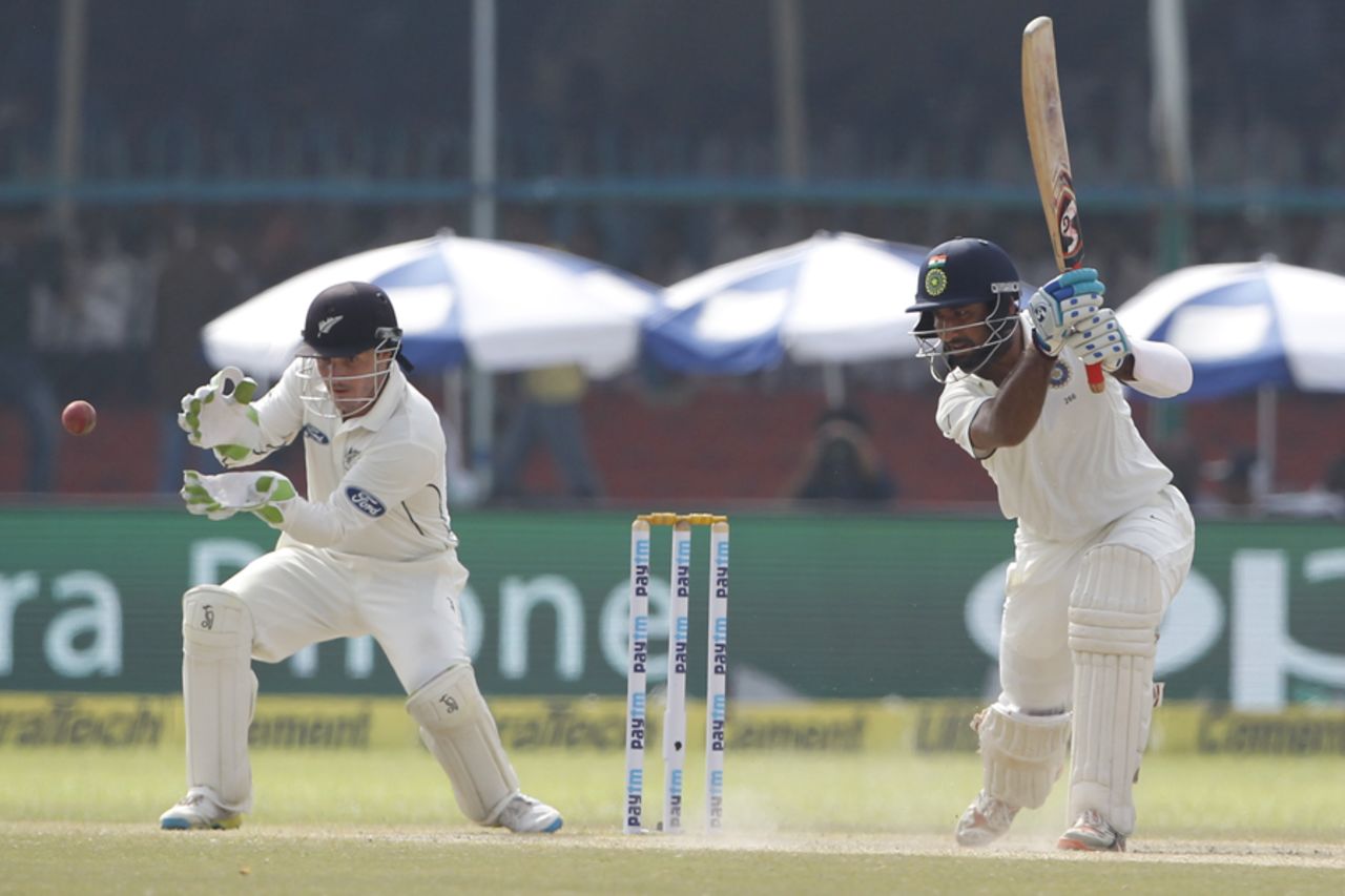 Cheteshwar Pujara drives through the off side, India v New Zealand, 1st Test, Kanpur, 4th day, September 25, 2016