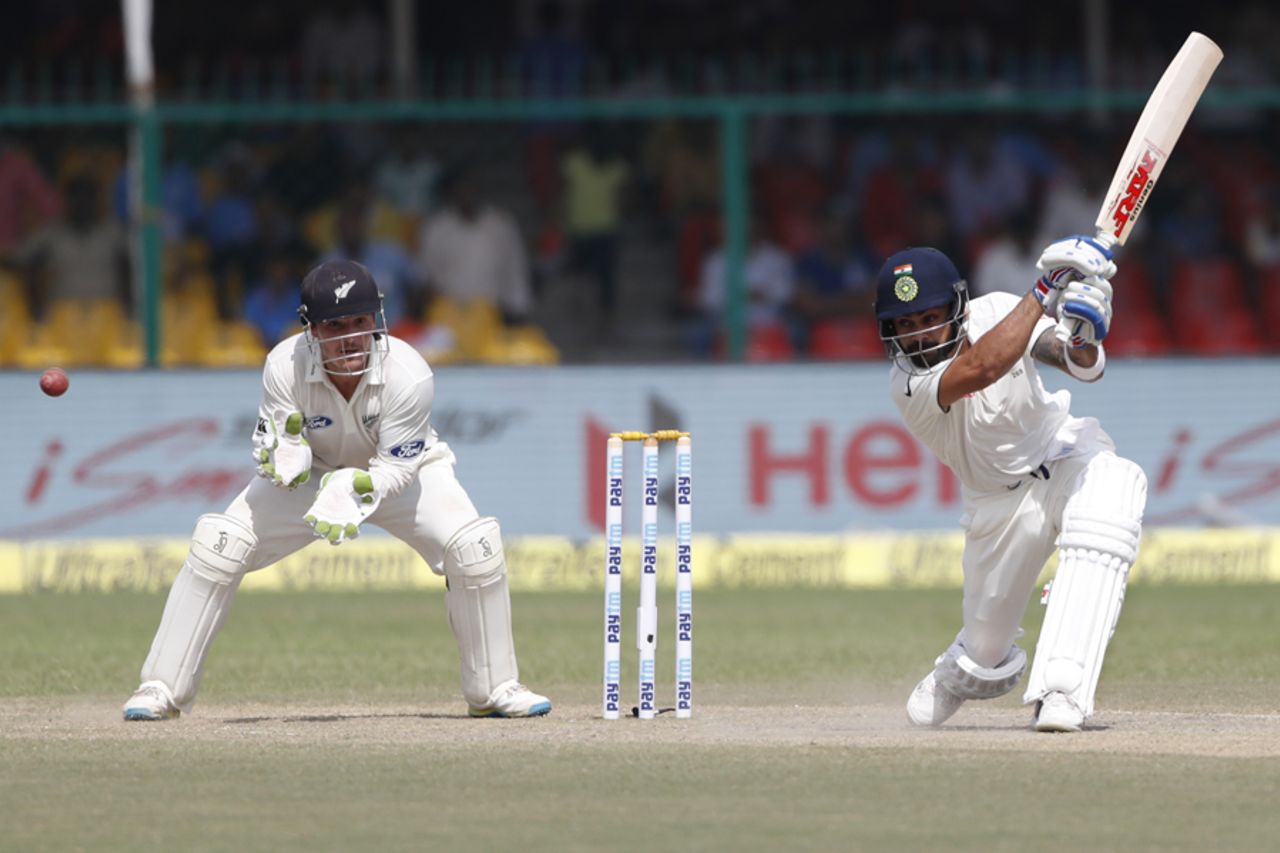 Virat Kohli plays an expansive inside-out drive, India v New Zealand, 1st Test, Kanpur, 4th day, September 25, 2016