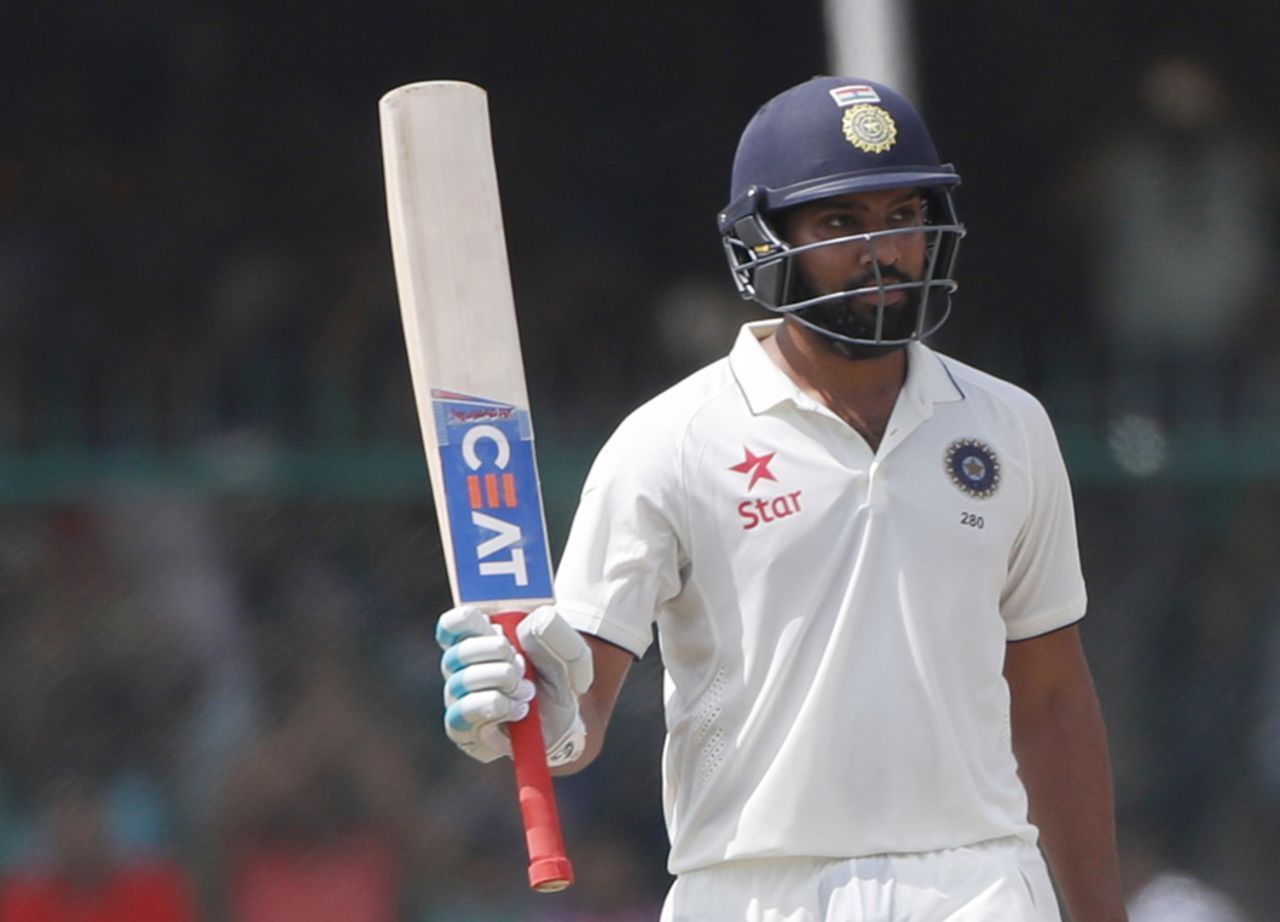 Rohit Sharma raises his bat after reaching fifty, India v New Zealand, 1st Test, Kanpur, 4th day, September 25, 2016