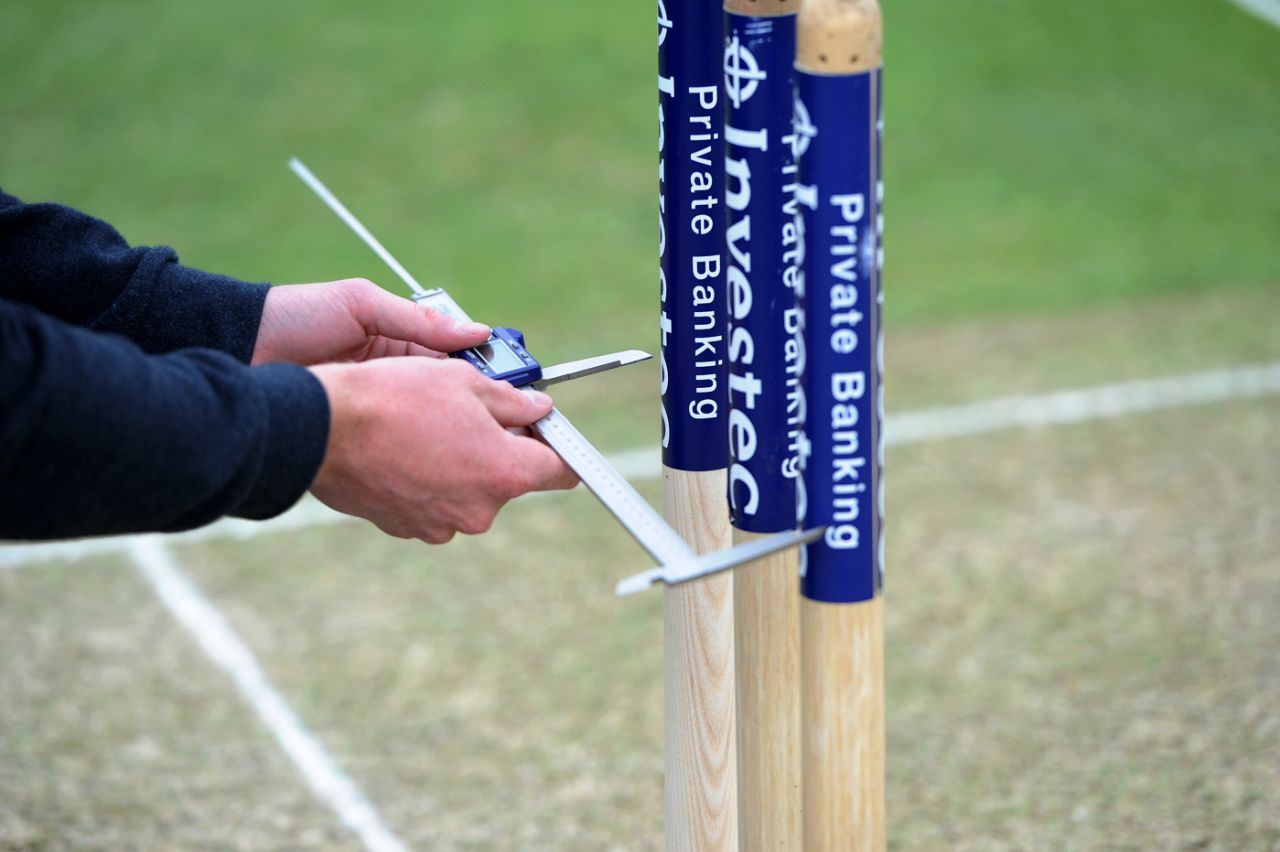 A Hawkeye technician measures the stumps, England v Australia, second Test, day one, Lord's, July 16, 2015