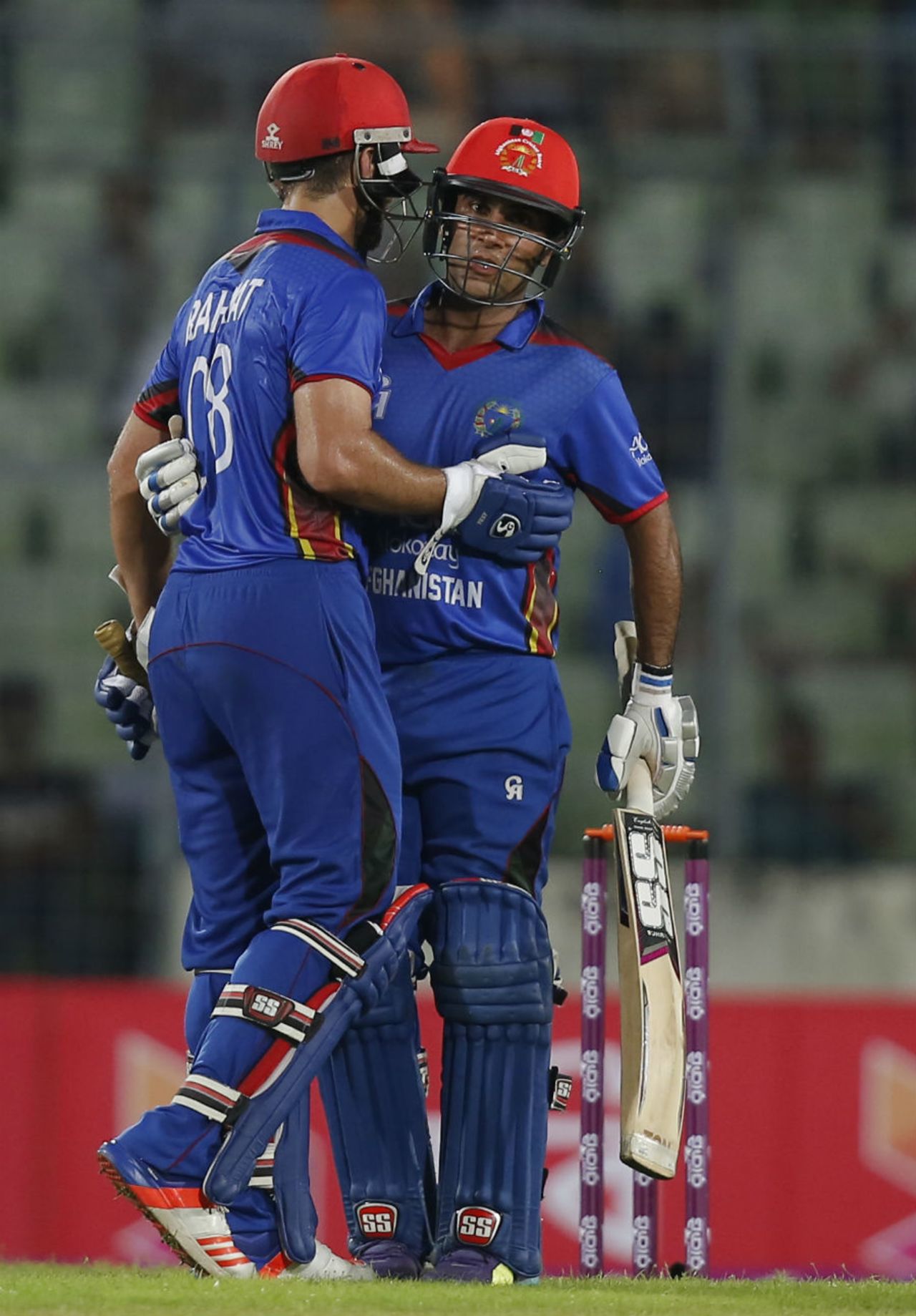Rahmat Shah is congratulated by his team-mate Hashmatullah Shahidi after completing his half-century, Bangladesh v Afghanistan, 1st ODI, September 25, 2016