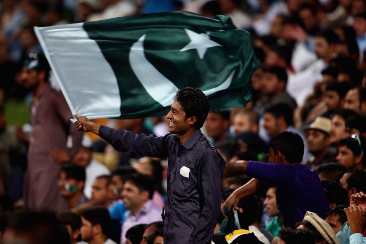 A Pakistani fan waves the flag to show his support, Pakistan v West Indies, 3rd T20I, Abu Dhabi, September 27, 2016
