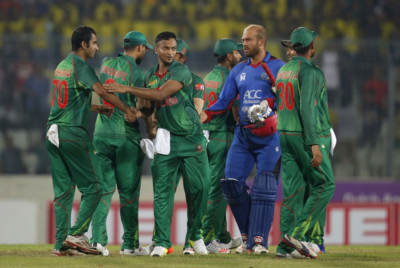 Bangladesh players celebrate after registering their 100th ODI win, Bangladesh v Afghanistan, 3rd ODI, Mirpur, October 1, 2016