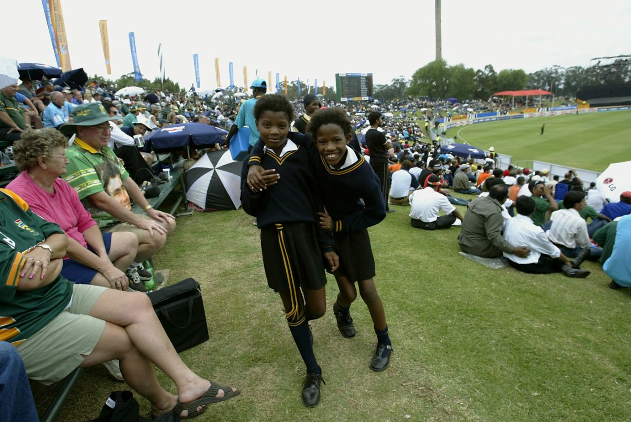 Two school kids pose for a photograph at the World Cup match, Bangladesh v West Indies, World Cup, Benoni, February 18, 2003