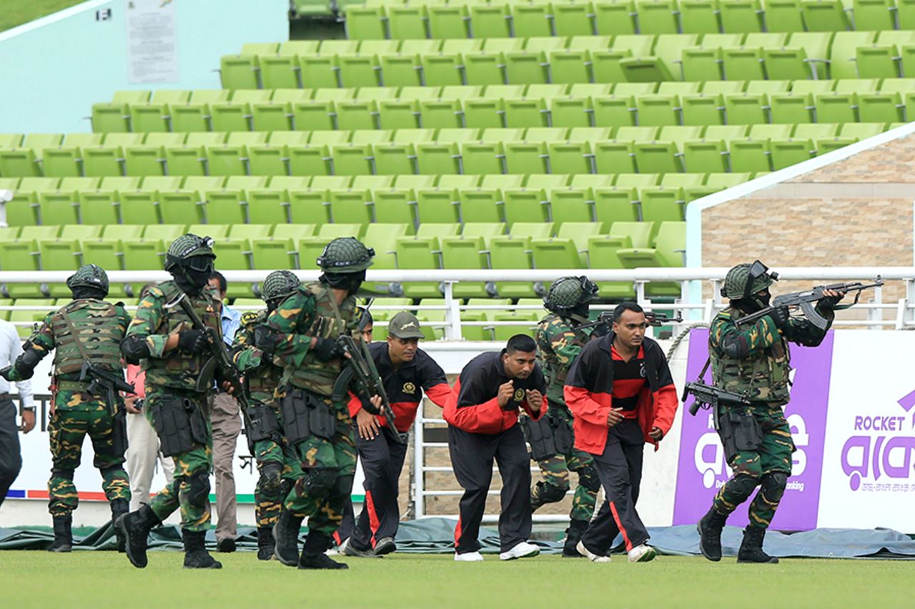 Security personnel and commandos conduct a mock drill at the Shere Bangla National Stadium on the eve of the first ODI between Bangladesh and England, Mirpur, October 6, 2016