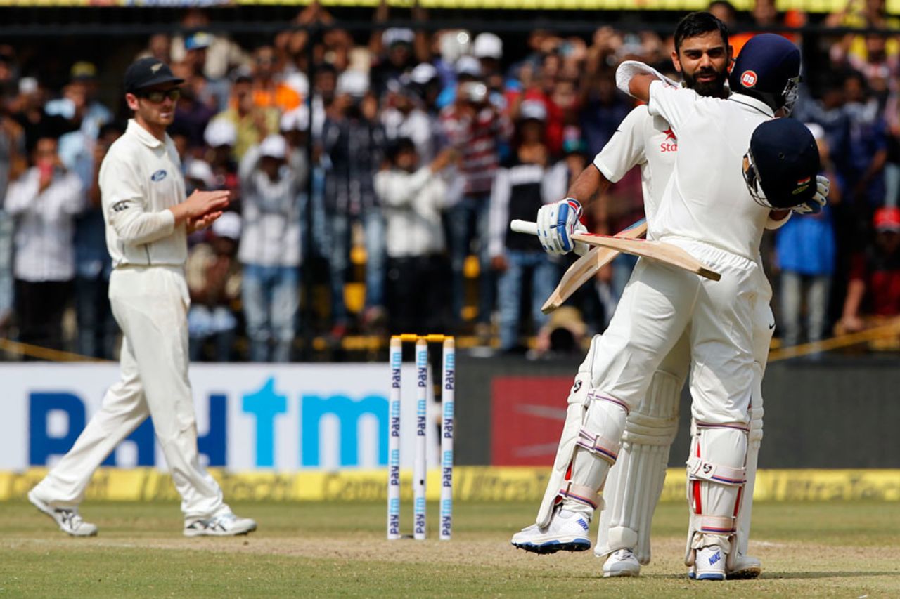 Virat Kohli gets a hug from Ajinkya Rahane on reaching 200, India v New Zealand, 3rd Test, Indore, 2nd day, October 9, 2016