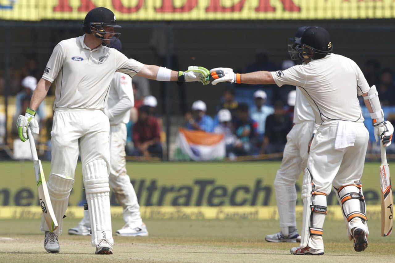 Martin Guptill and Tom Latham celebrate their century stand, India v New Zealand, 3rd Test, Indore, 3rd day, October 10, 2016 