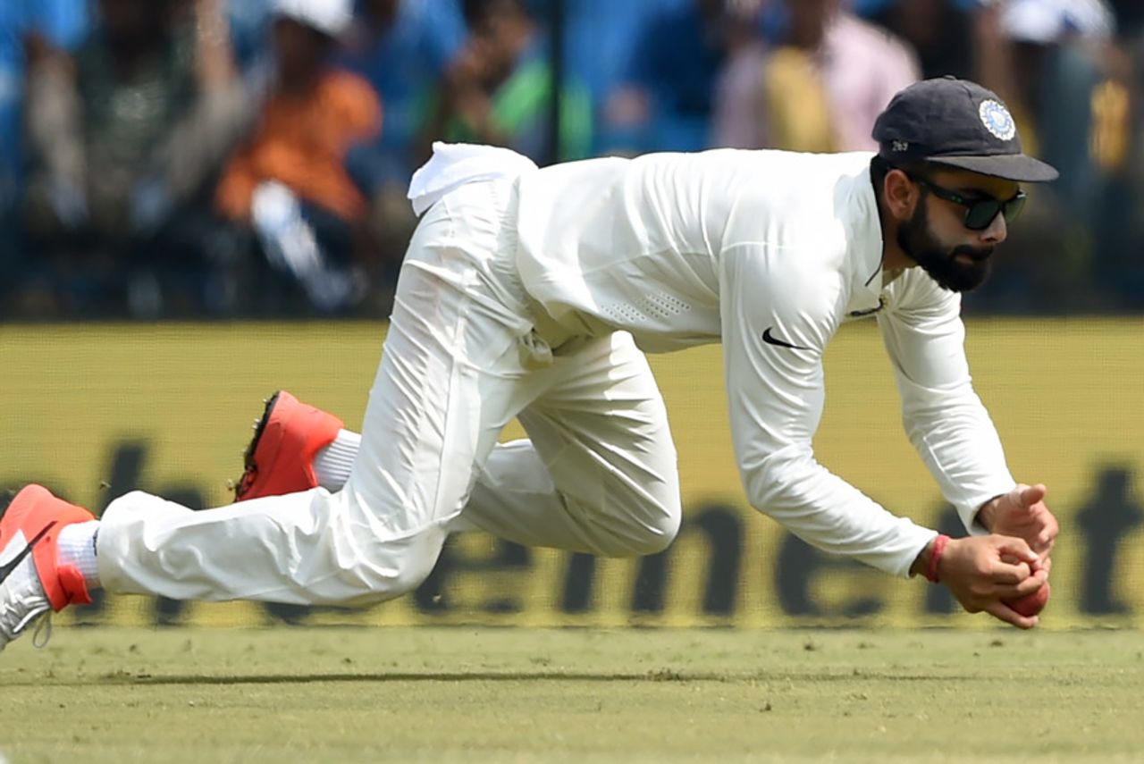 Virat Kohli makes a tumbling stop, India v New Zealand, 3rd Test, Indore, 3rd day, October 10, 2016