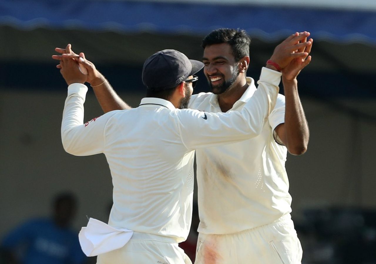 R Ashwin and Virat Kohli celebrate a wicket, India v New Zealand, 3rd Test, Indore, 4th day, October 11, 2016