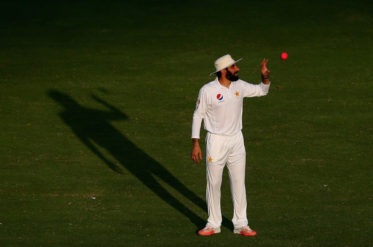 Misbah-ul-Haq gets up close and personal with the pink ball, Pakistan v West Indies, 1st Test, Dubai, 3rd day, October 15, 2016
