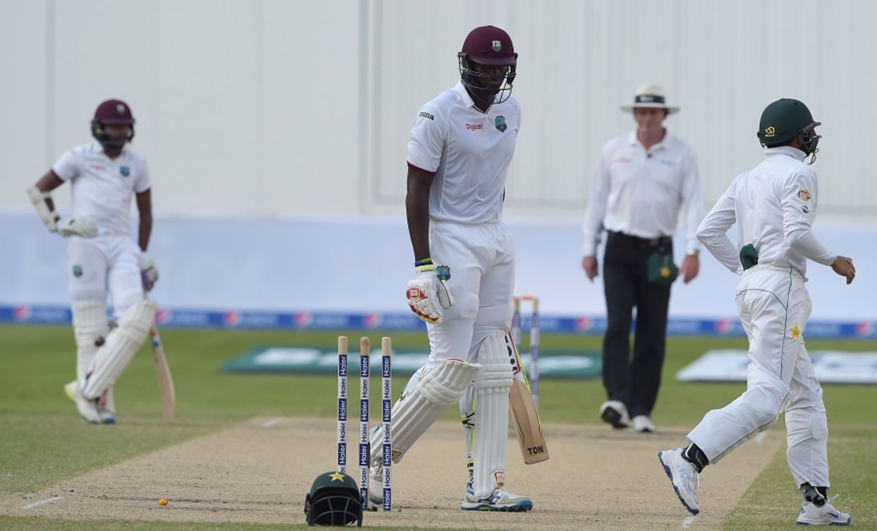 Jason Holder walks off after being bowled by Yasir Shah, Pakistan v West Indies, 1st Test, Dubai, 4th day, October 16, 2016