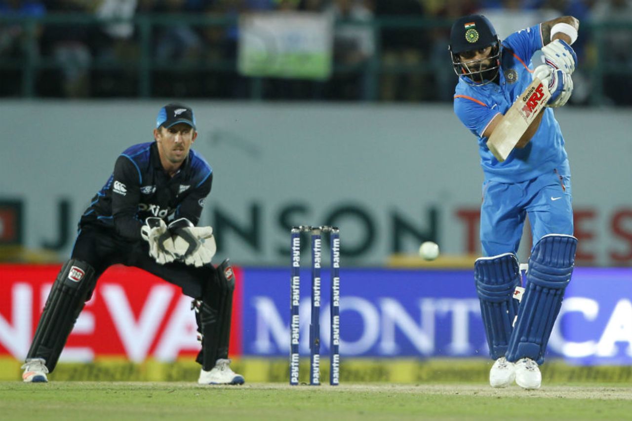 Virat Kohli punches the ball onto the off side, India v New Zealand, 1st ODI, Dharamsala, October 16, 2016