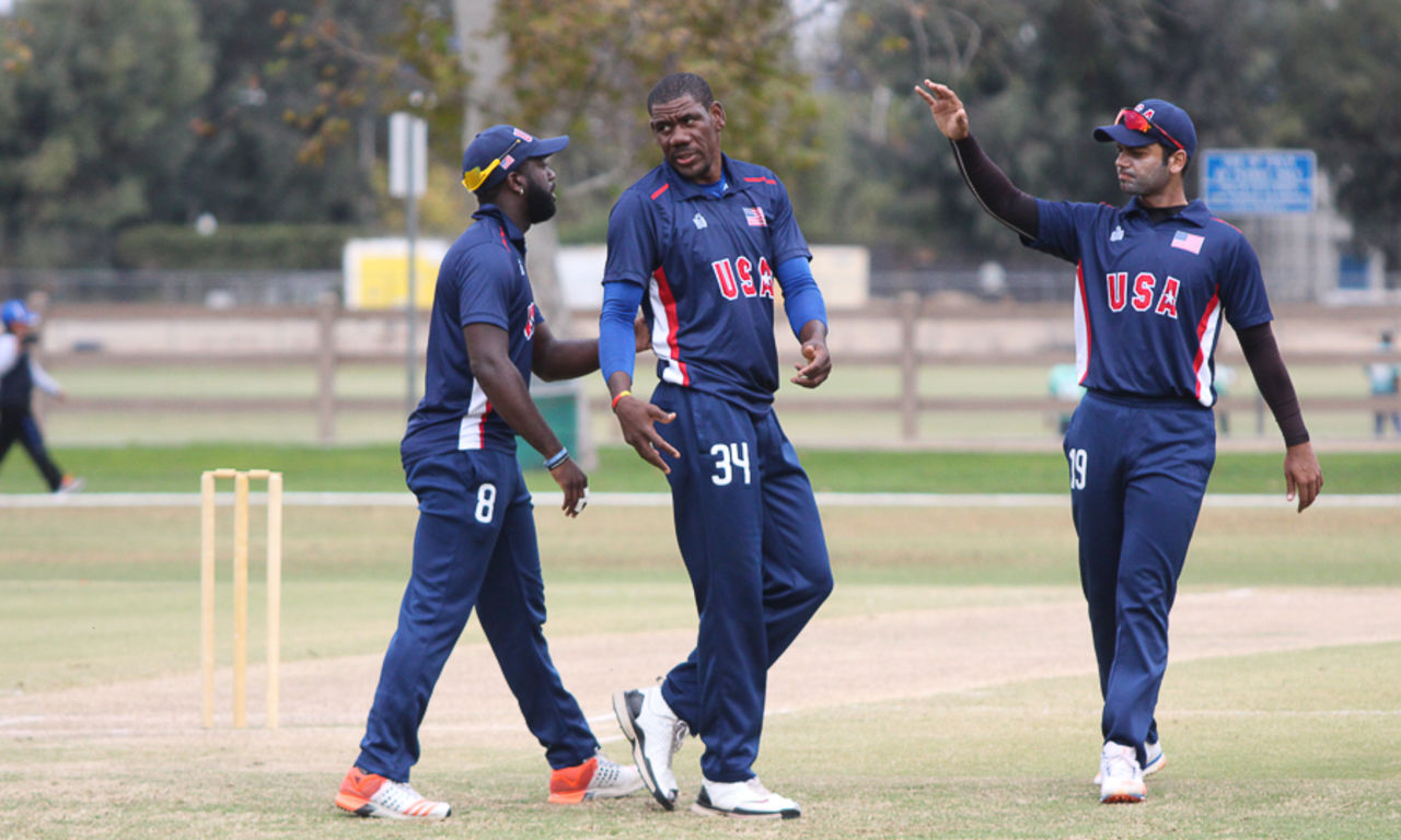 Elmore Hutchinson gets congratulated after taking the wicket of Shehan Kamileen, USA v Canada, Auty Cup, Los Angeles, October 16, 2016 