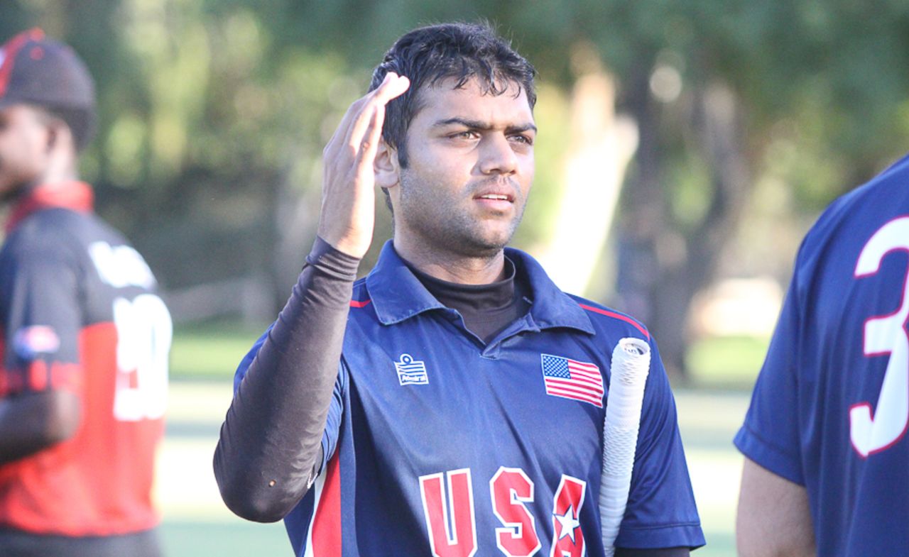 Ravi Timbawala goes to high five a team-mate after walking off unbeaten on 73, USA v Canada, Auty Cup, Los Angeles, October 16, 2016