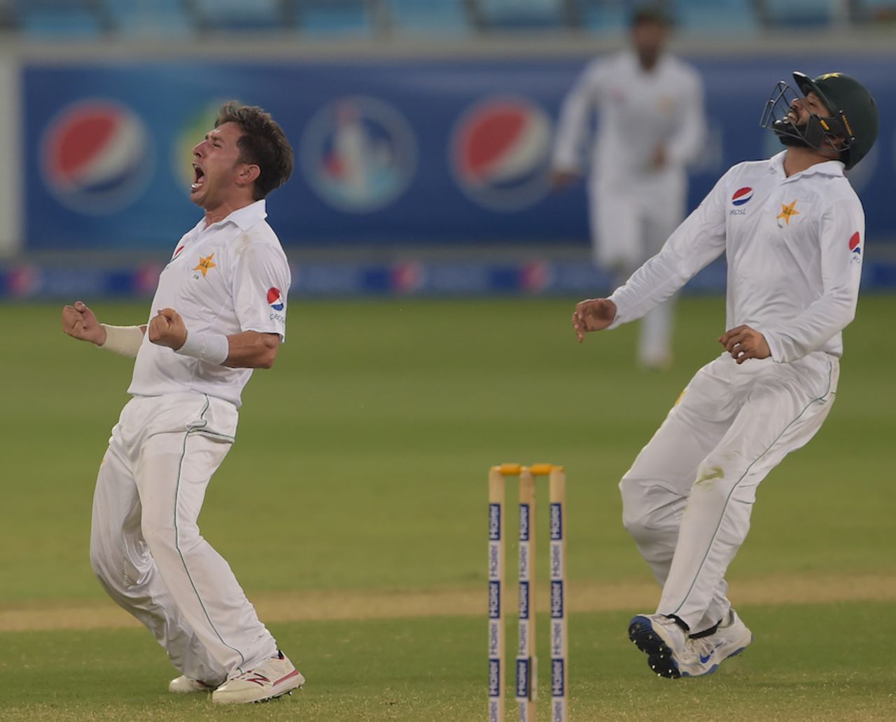 Yasir Shah celebrates after taking a stunning catch, Pakistan v West Indies, 1st Test, Dubai, 5th day, October 17, 2016