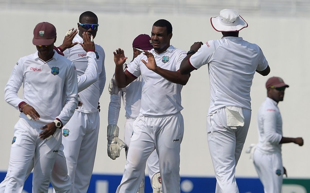 Shannon Gabriel celebrates with team-mates after dismissing Asad Shafiq, Pakistan v West Indies, 2nd Test, Abu Dhabi, 1st day, October 21, 2016