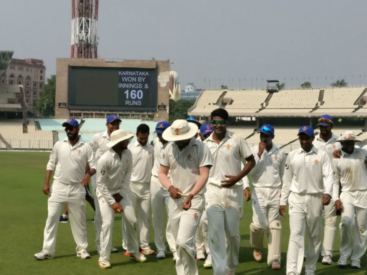K Gowtham leads Karnataka off the field after their innings and 160-run win over Delhi at Eden Gardens in Kolkata, Karnataka v Delhi, Ranji Trophy 2016-17, Group B, 3rd day, October 22, 2016