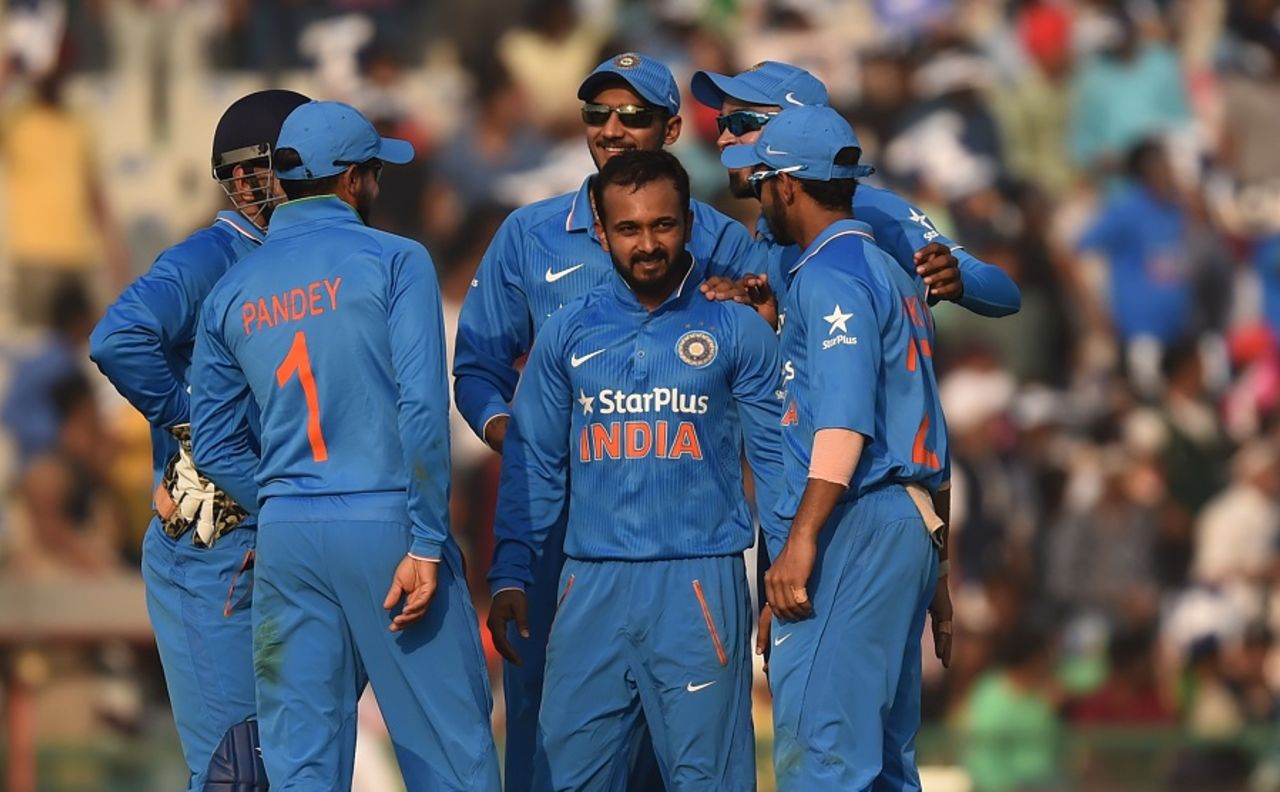 Kedar Jadhav celebrates with team-mates after taking a wicket, India v New Zealand, 3rd ODI, Mohali, October 23, 2016
