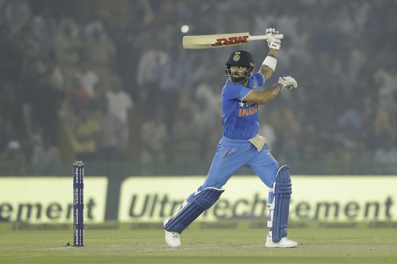 Virat Kohli plays a one-handed shot behind the wicket, India v New Zealand, 3rd ODI, Mohali, October 23, 2016