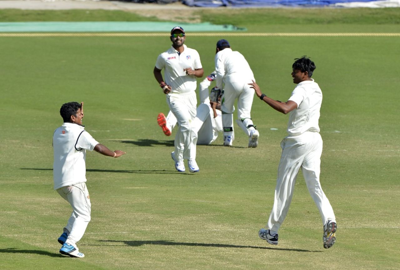 Uttar Pradesh players celebrate after picking up a wicket, Tamil Nadu v Uttar Pradesh, Ranji Trophy 2016-17, Group A, Dharamsala, 4th day, October 23, 2016