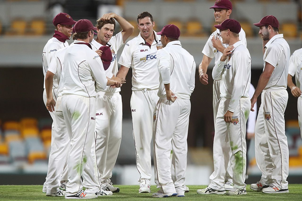 Luke Feldman celebrates one of his five wickets on the day, Queensland v New South Wales Sheffield Shield 2015-16, 1st day, Brisbane, October 25, 2016