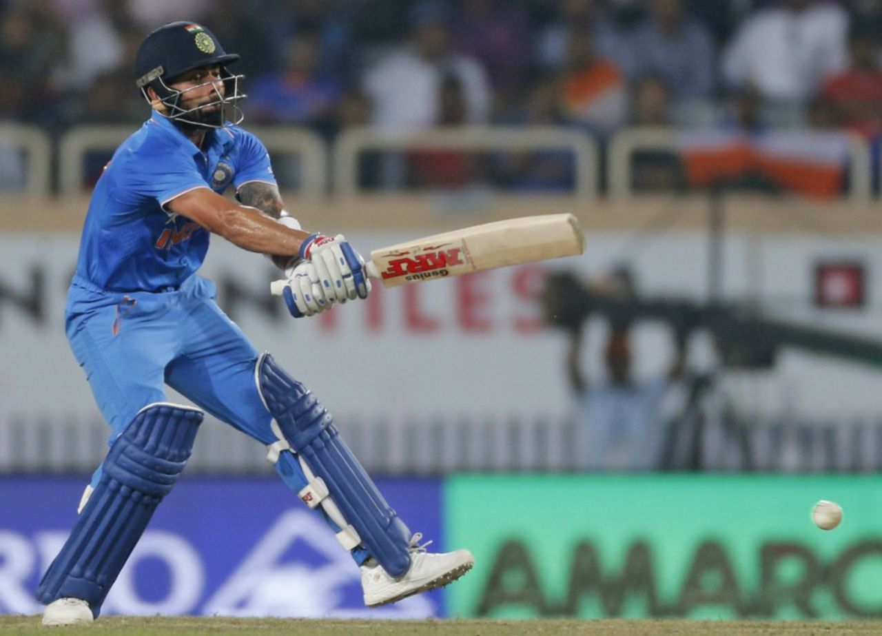Virat Kohli adjusts to a delivery that kept low, India v New Zealand, 4th ODI, Ranchi, October 26, 2016