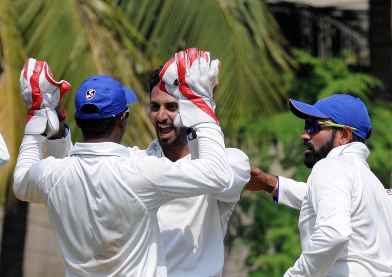 S Aravind is jubilant after picking up a wicket, Assam v Karnataka, Ranji Trophy, Group B, 1st day, October 27, 2016