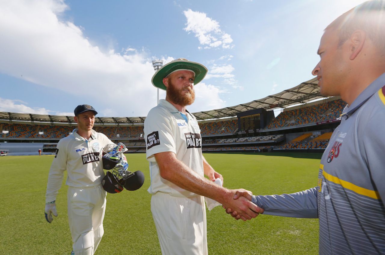 Doug Bollinger shakes hands with Usman Khawaja, Queensland v New South Wales, Sheffield Shield, Brisbane, 4th day, October 28, 2016